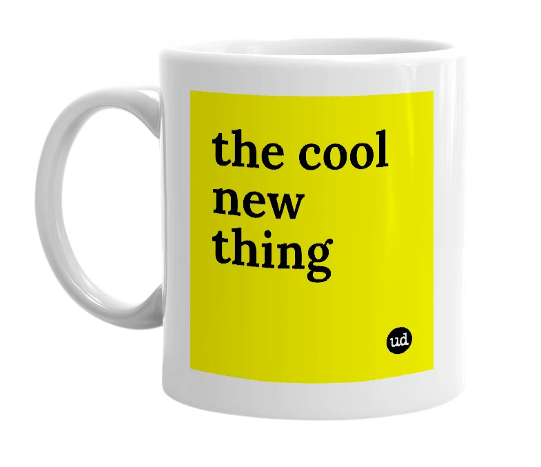 White mug with 'the cool new thing' in bold black letters