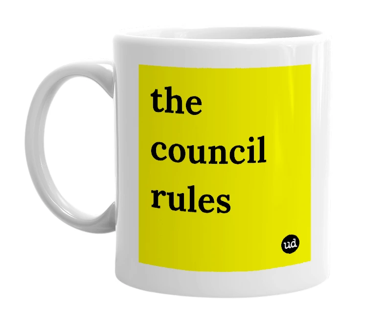 White mug with 'the council rules' in bold black letters