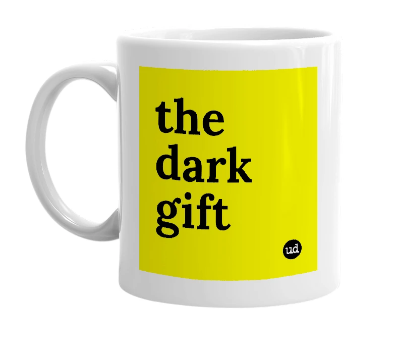 White mug with 'the dark gift' in bold black letters