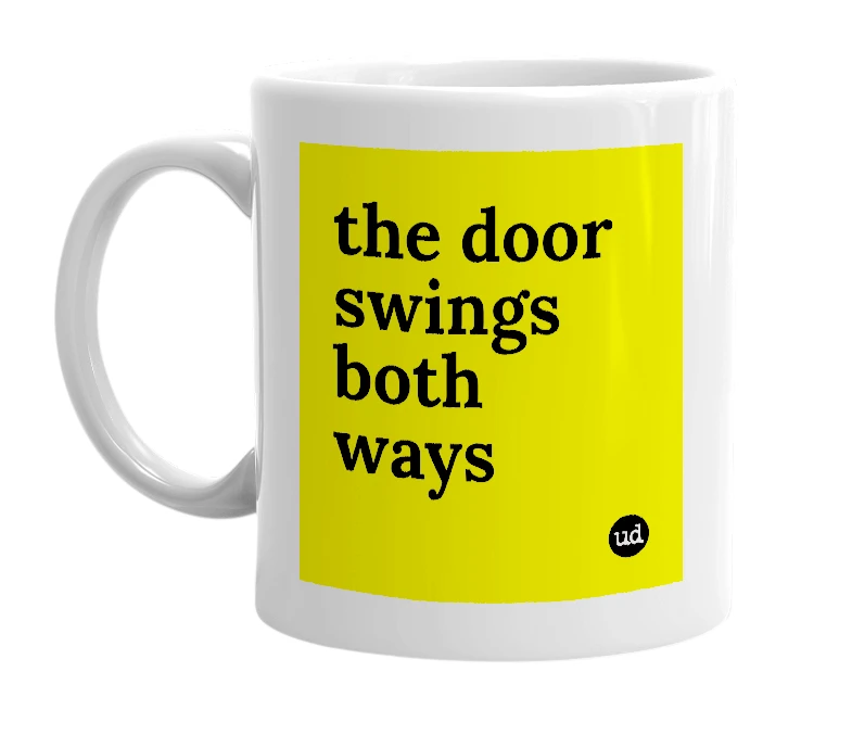 White mug with 'the door swings both ways' in bold black letters