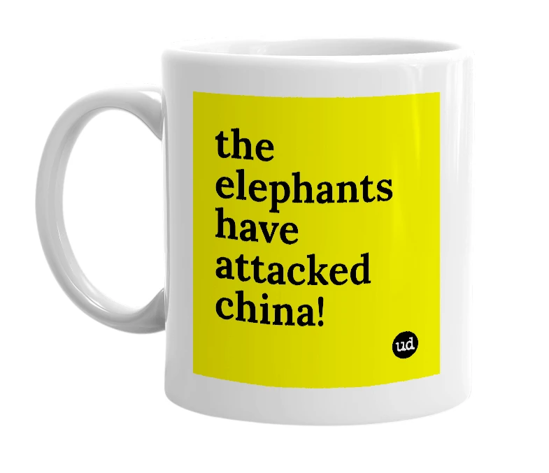 White mug with 'the elephants have attacked china!' in bold black letters