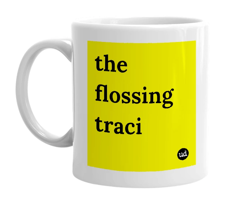 White mug with 'the flossing traci' in bold black letters