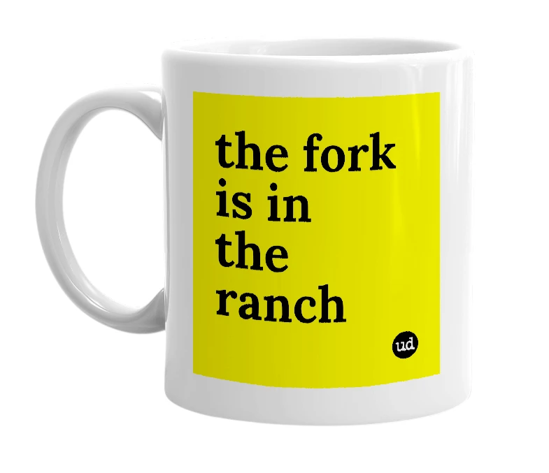 White mug with 'the fork is in the ranch' in bold black letters