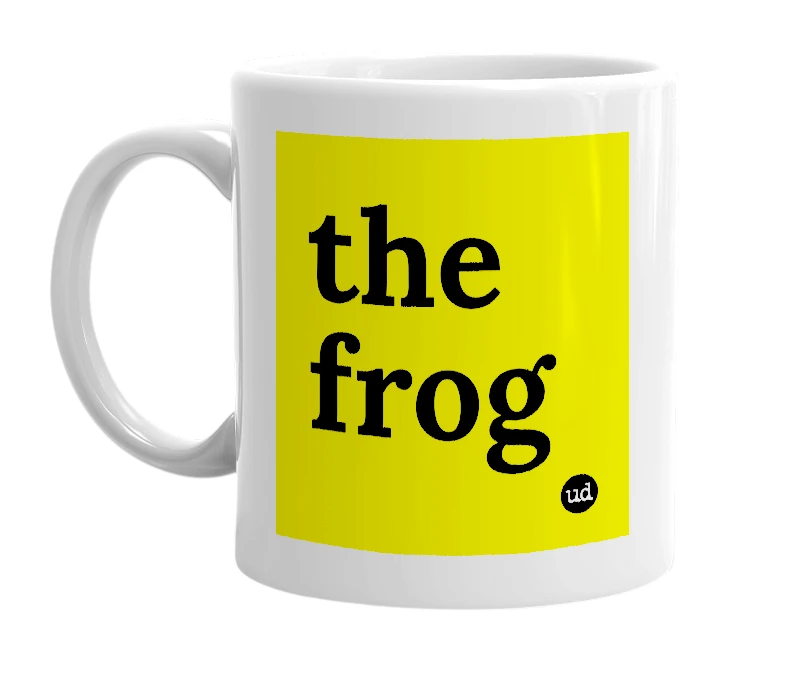 White mug with 'the frog' in bold black letters