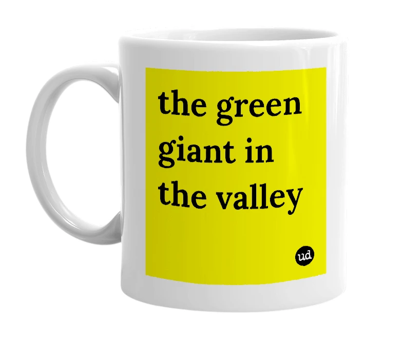 White mug with 'the green giant in the valley' in bold black letters