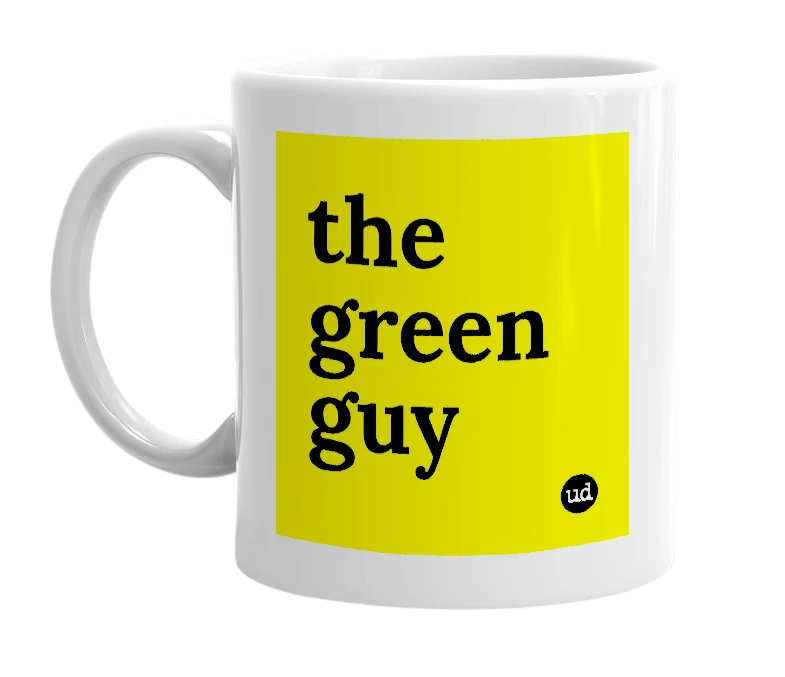 White mug with 'the green guy' in bold black letters