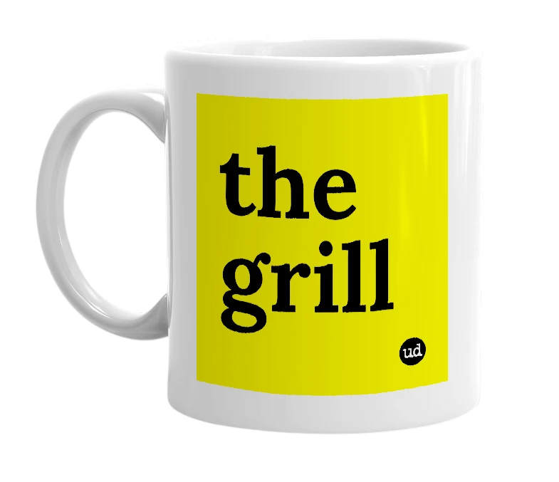 White mug with 'the grill' in bold black letters