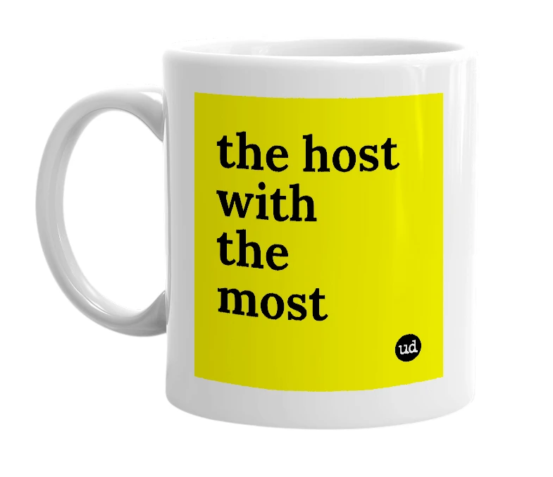 White mug with 'the host with the most' in bold black letters