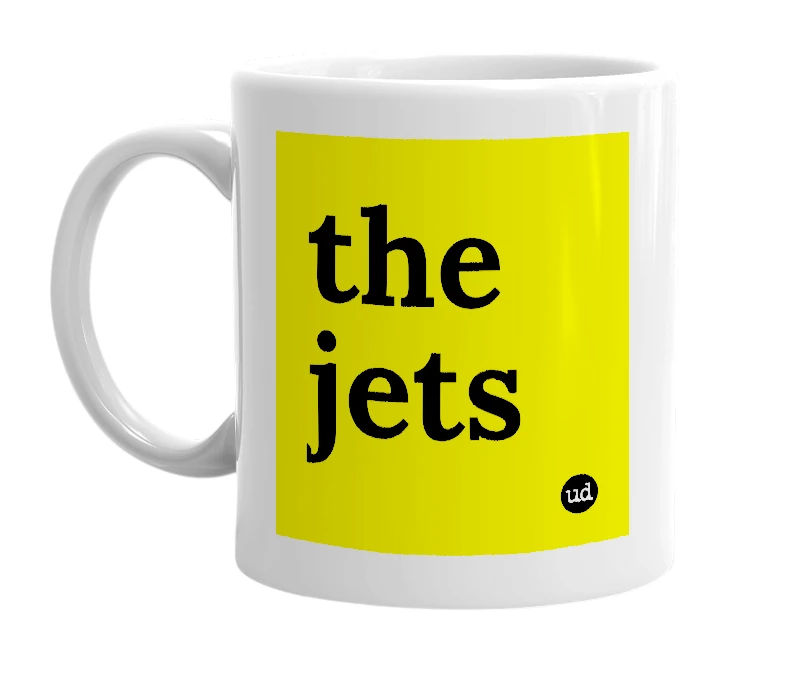 White mug with 'the jets' in bold black letters