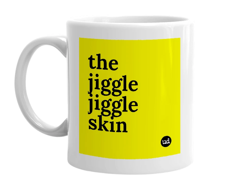 White mug with 'the jiggle jiggle skin' in bold black letters