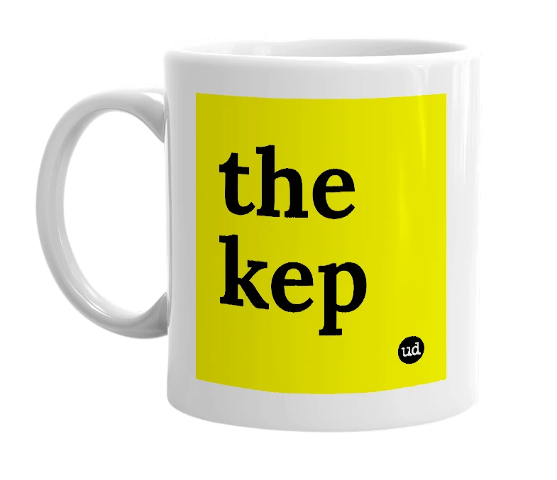 White mug with 'the kep' in bold black letters