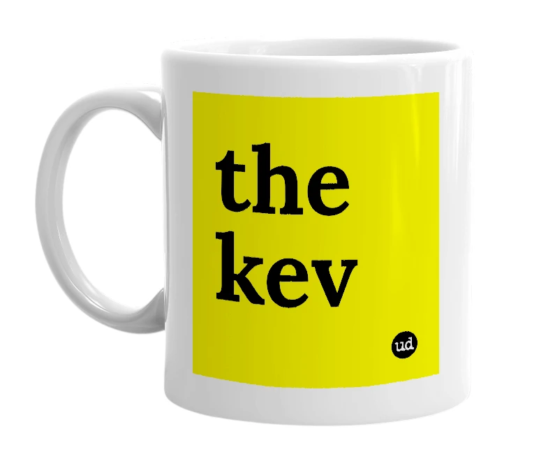White mug with 'the kev' in bold black letters
