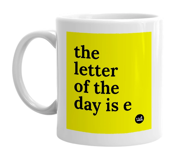 White mug with 'the letter of the day is e' in bold black letters