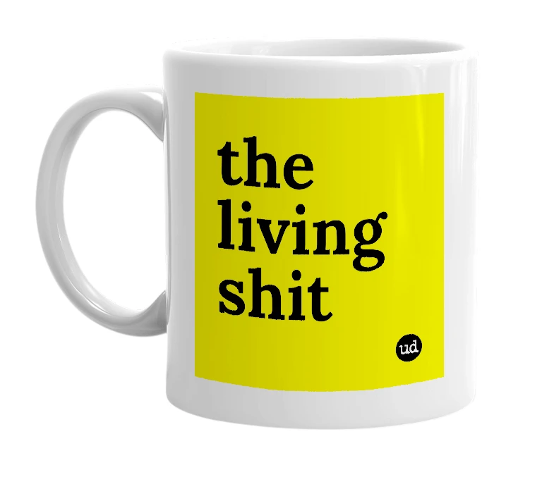 White mug with 'the living shit' in bold black letters