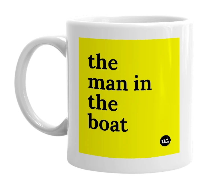 White mug with 'the man in the boat' in bold black letters