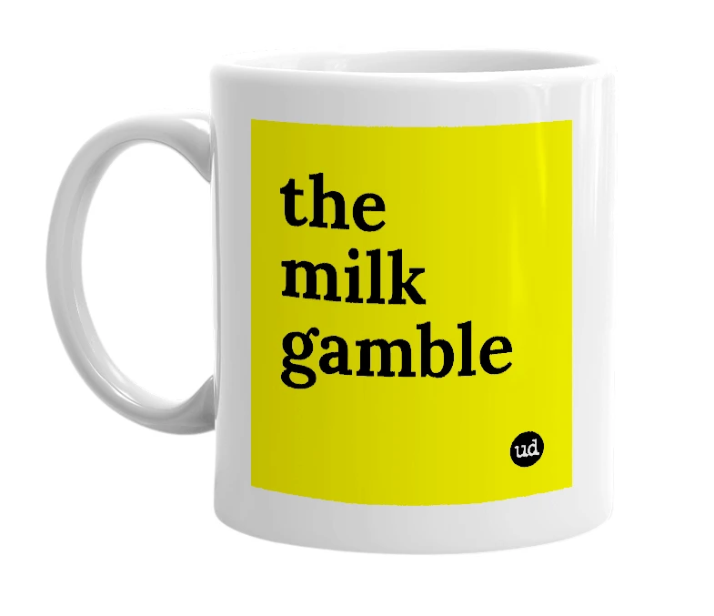 White mug with 'the milk gamble' in bold black letters