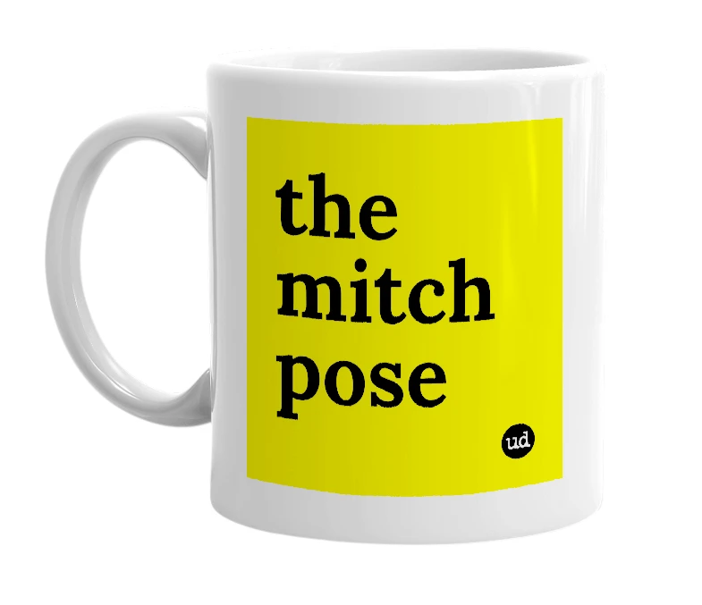 White mug with 'the mitch pose' in bold black letters