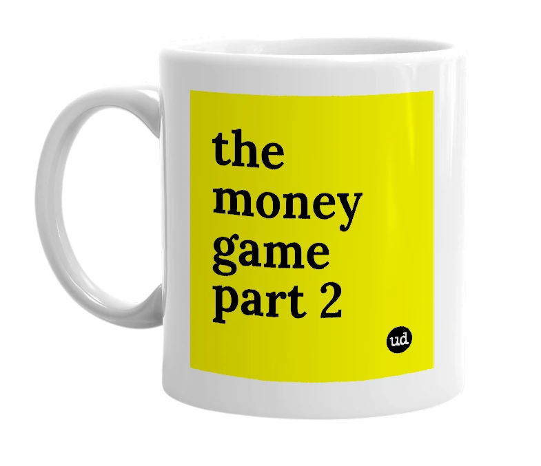 White mug with 'the money game part 2' in bold black letters