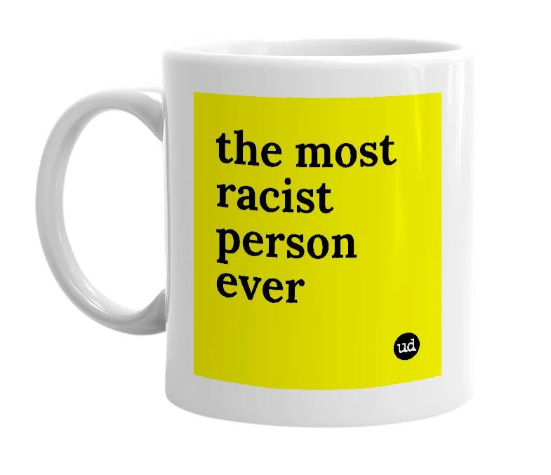 White mug with 'the most racist person ever' in bold black letters