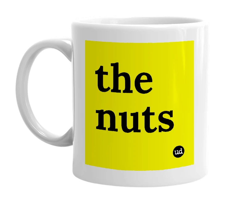 White mug with 'the nuts' in bold black letters