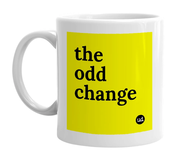White mug with 'the odd change' in bold black letters
