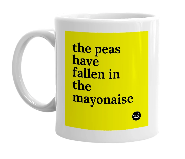 White mug with 'the peas have fallen in the mayonaise' in bold black letters