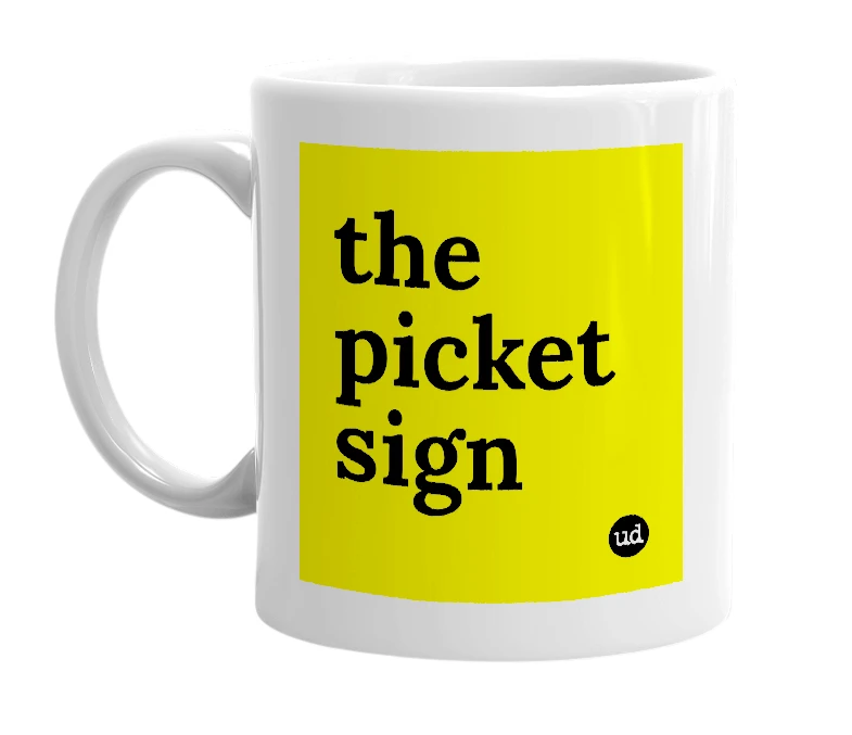White mug with 'the picket sign' in bold black letters