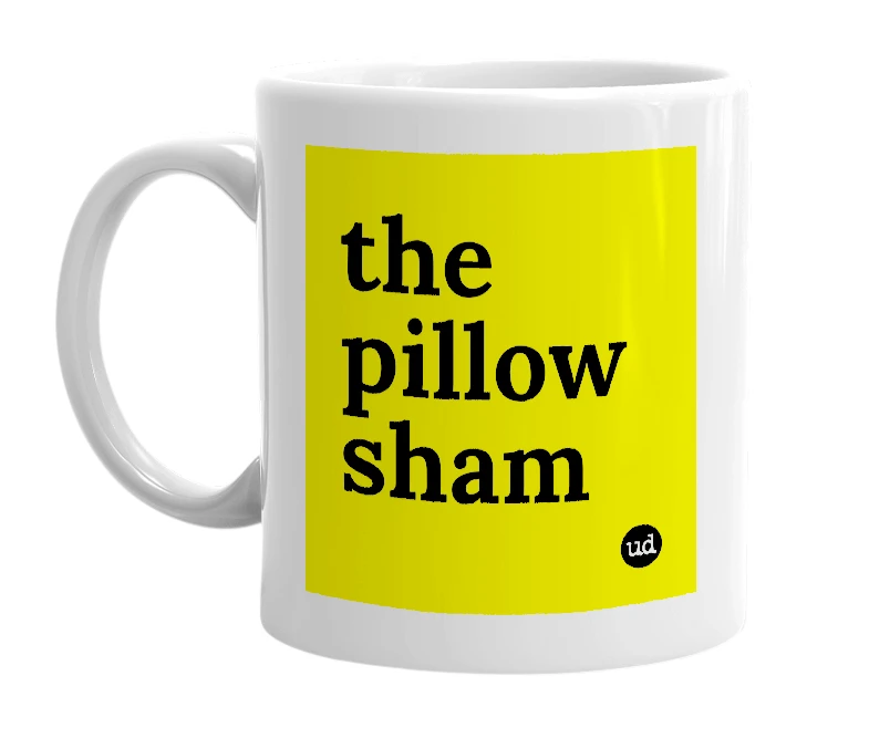 White mug with 'the pillow sham' in bold black letters