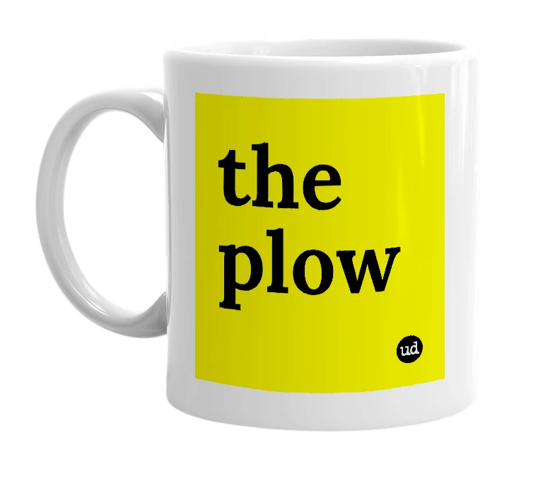 White mug with 'the plow' in bold black letters