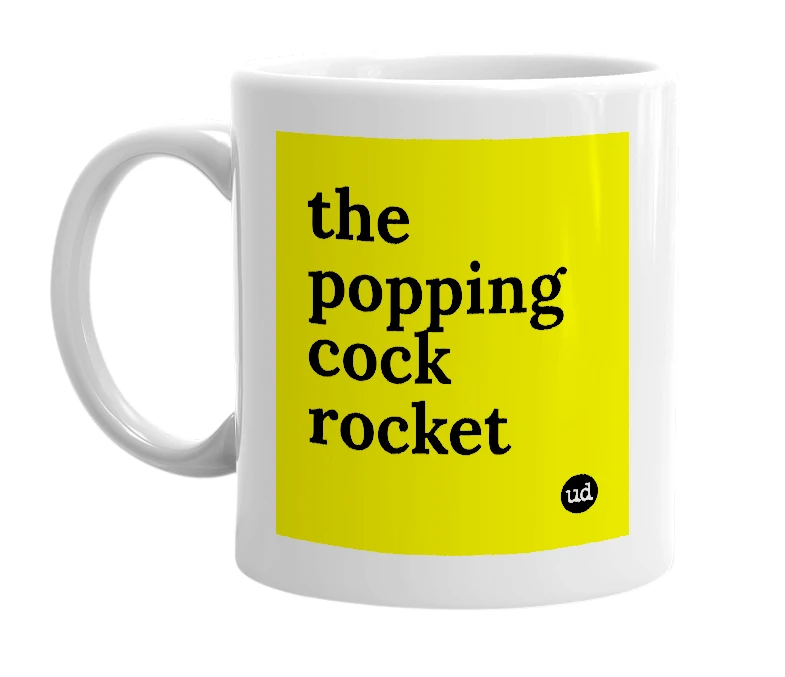 White mug with 'the popping cock rocket' in bold black letters