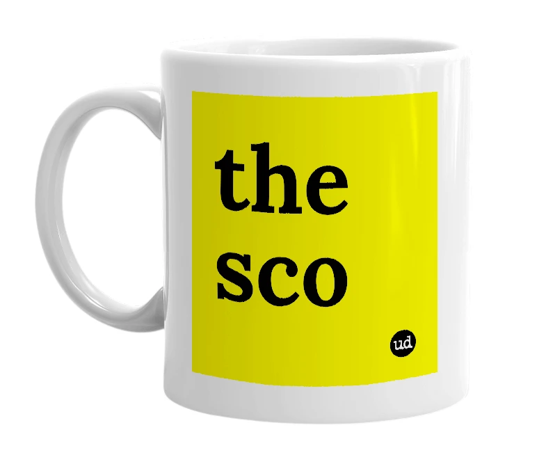 White mug with 'the sco' in bold black letters