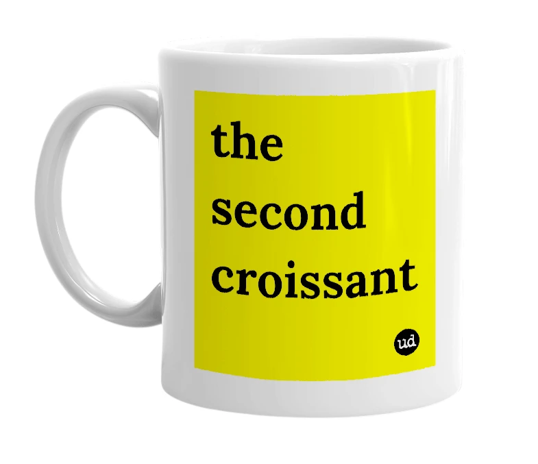 White mug with 'the second croissant' in bold black letters