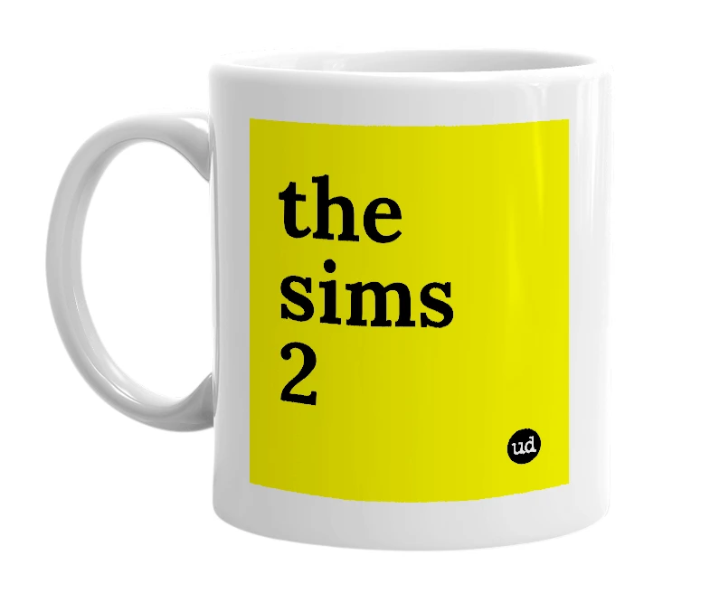 White mug with 'the sims 2' in bold black letters