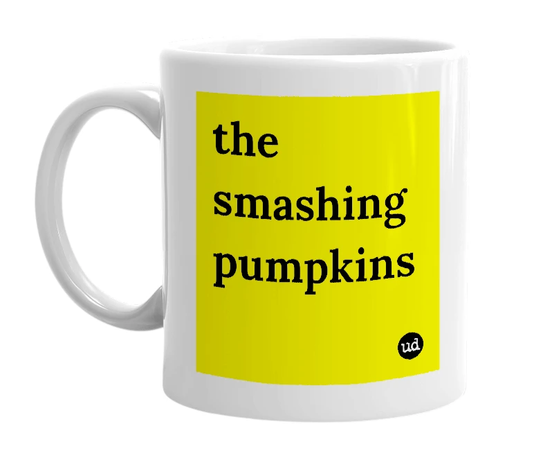 White mug with 'the smashing pumpkins' in bold black letters