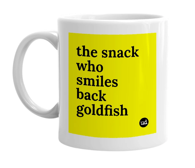 White mug with 'the snack who smiles back goldfish' in bold black letters
