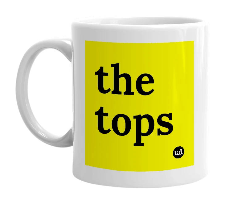 White mug with 'the tops' in bold black letters