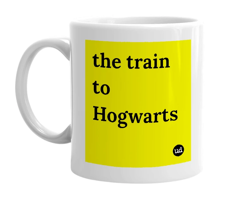 White mug with 'the train to Hogwarts' in bold black letters