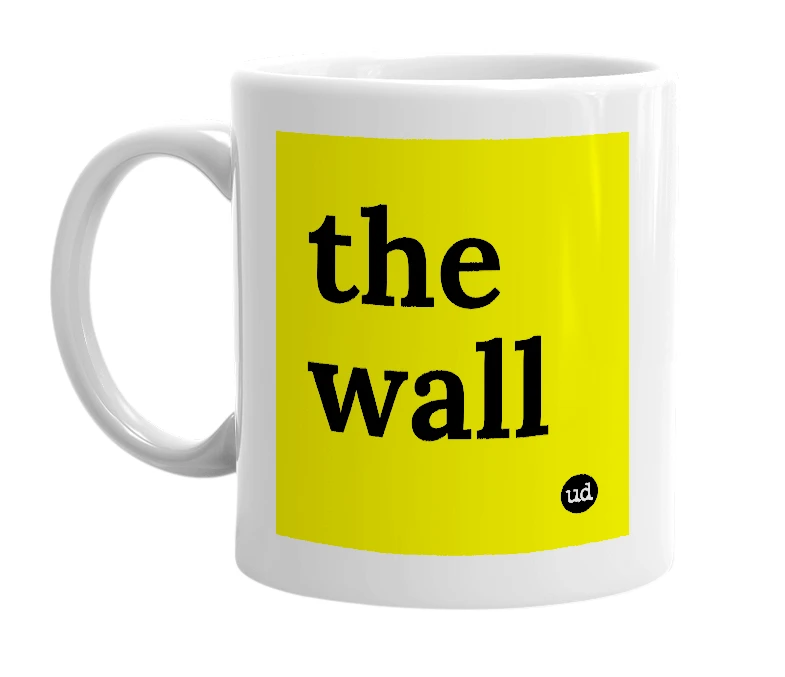 White mug with 'the wall' in bold black letters