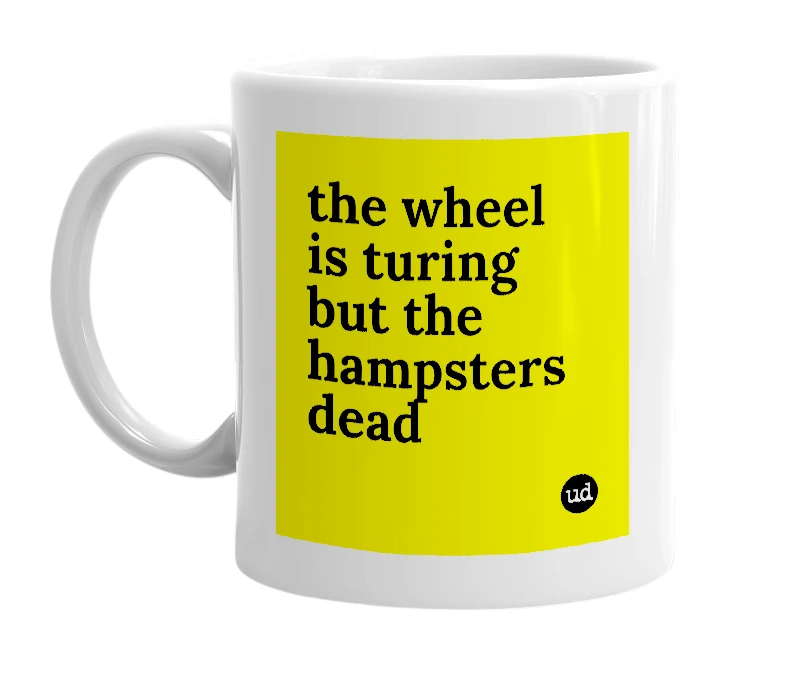 White mug with 'the wheel is turing but the hampsters dead' in bold black letters