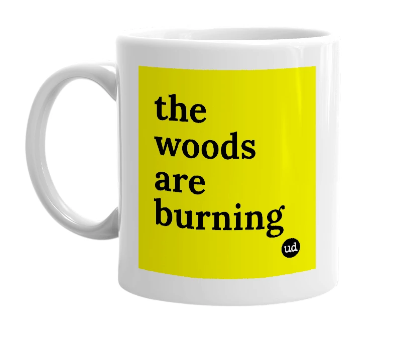 White mug with 'the woods are burning' in bold black letters