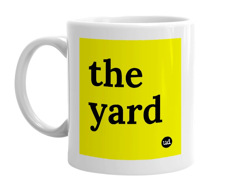 White mug with 'the yard' in bold black letters