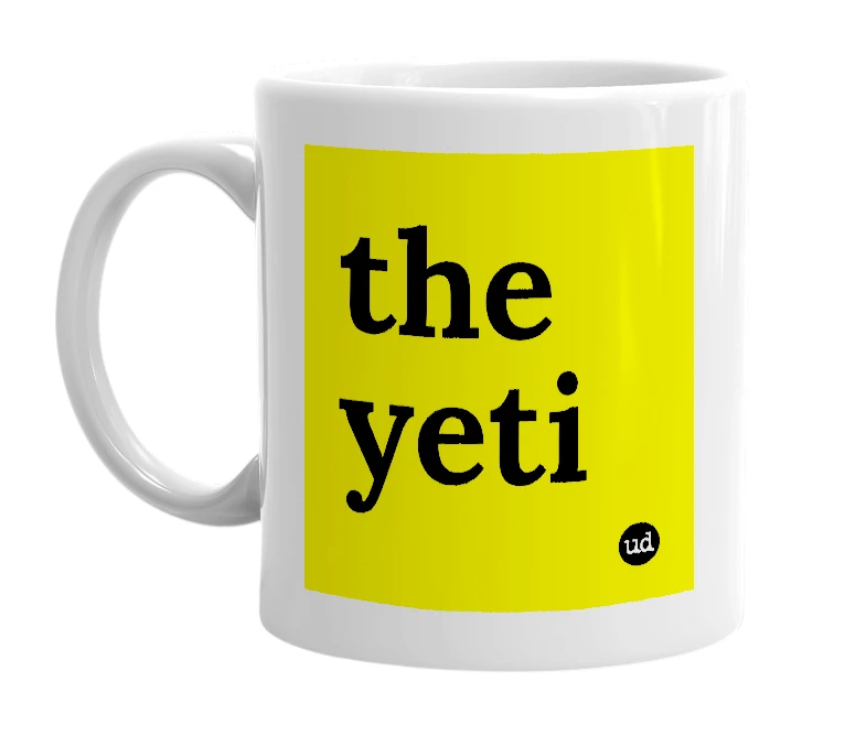 White mug with 'the yeti' in bold black letters