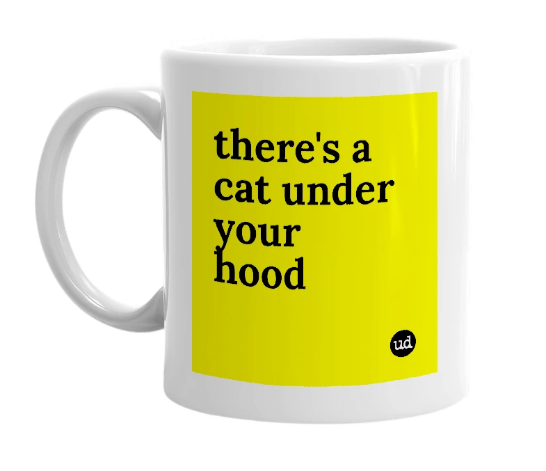 White mug with 'there's a cat under your hood' in bold black letters