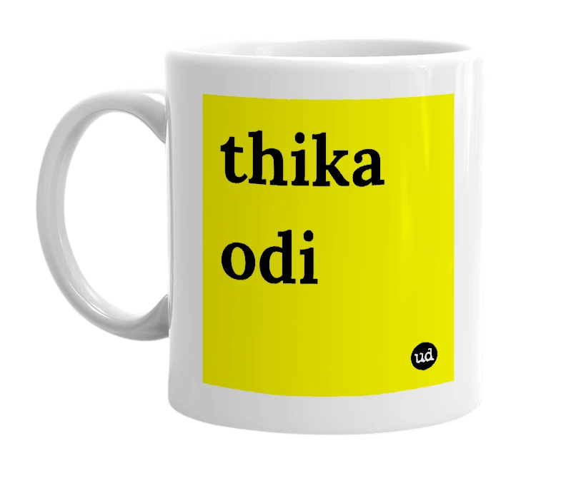 White mug with 'thika odi' in bold black letters