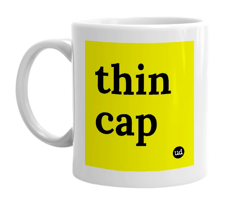 White mug with 'thin cap' in bold black letters