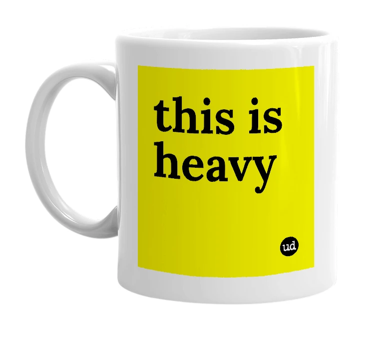 White mug with 'this is heavy' in bold black letters