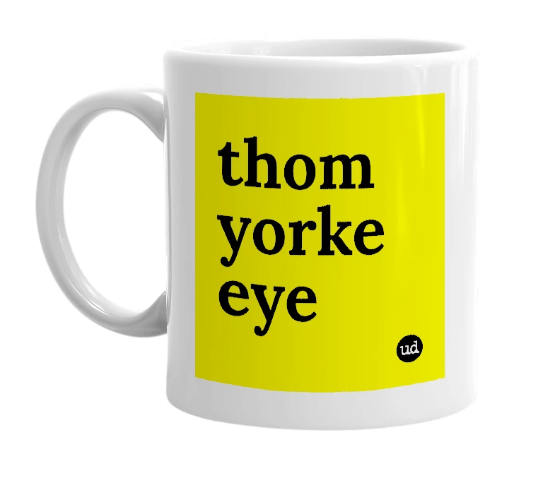 White mug with 'thom yorke eye' in bold black letters