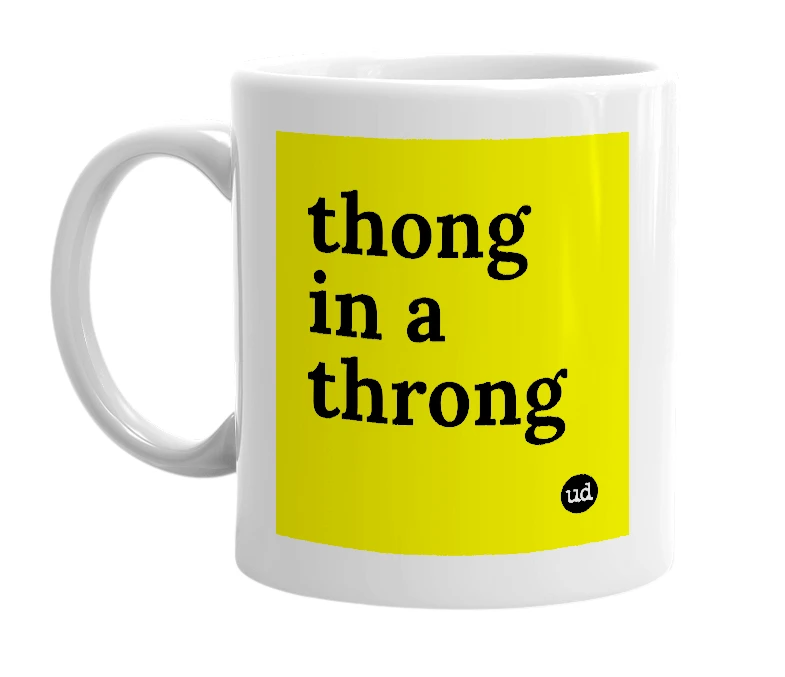 White mug with 'thong in a throng' in bold black letters