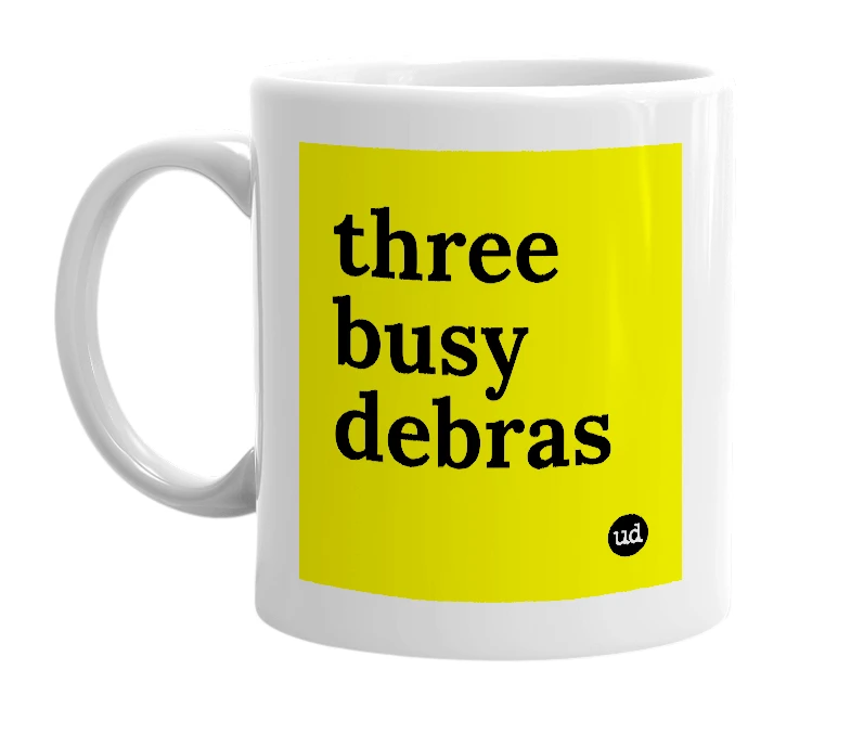 White mug with 'three busy debras' in bold black letters