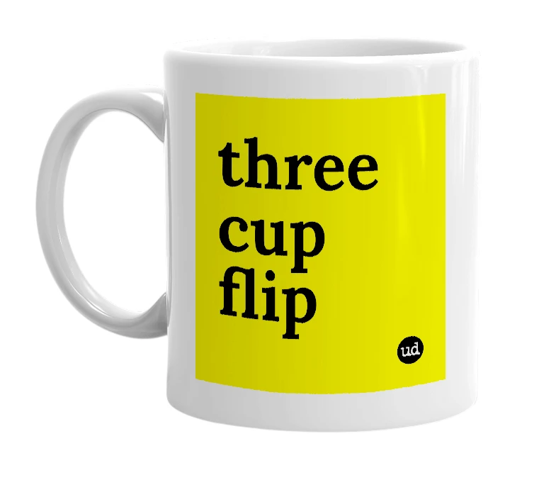 White mug with 'three cup flip' in bold black letters